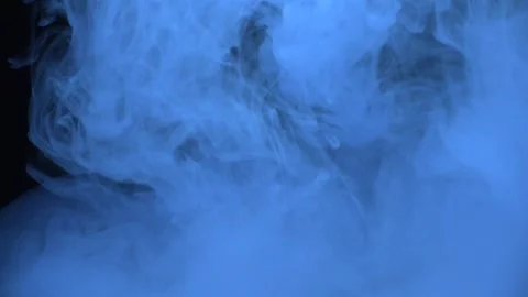 Cloud Blue Smoke Swirling in Dark Environment Stock Footage 335978657