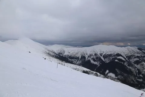 Cloud-Capped Peak Above Ski Slope in Low Tatras Stock-Fotos