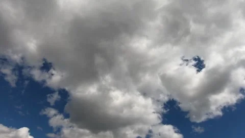 Cloud with clear sky 4K Time lapse White puffy clouds moving summer beautiful Video stock 336568476