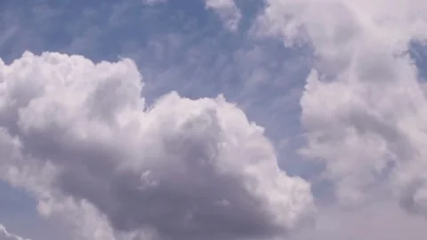 Cloud with clear sky 4K Time lapse White puffy clouds moving summer beautiful Video stock 336568676