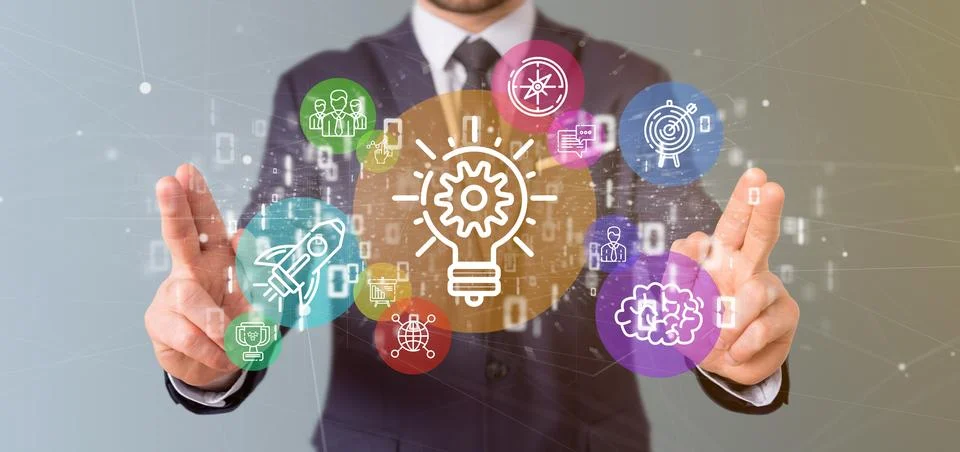 Cloud of colorfull start up icon bubble with data Businessman holding a bin.. Stock Photos