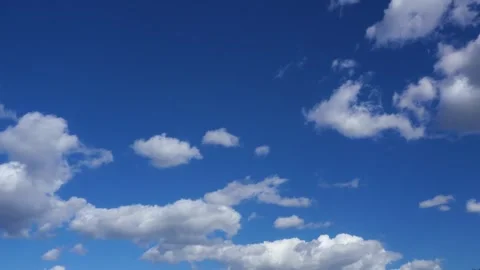 Cloud compositions on a blue sky. Timelapse Stock Footage 338127742
