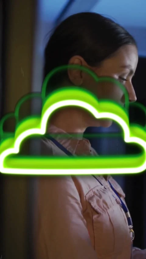 Cloud computing animation over woman using tablet in server room Stock Footage 323780938