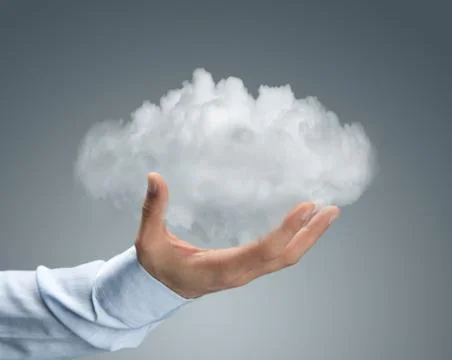 Cloud computing, close up of male hand holding cloud Stock Photos