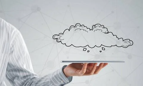 Cloud computing concept Close view of businessman holding tablet pc and cl... Stock Photos