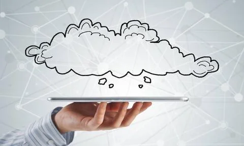 Cloud computing concept Close view of businessman holding tablet pc and cl... Stock Photos