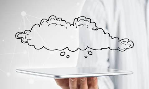 Cloud computing concept Close view of businessman holding tablet pc and cl... Stock Photos