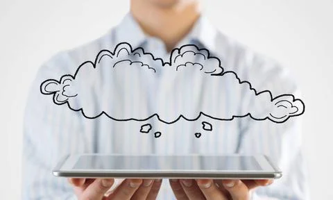 Cloud computing concept Close view of businessman holding tablet pc and cl... Stock Photos