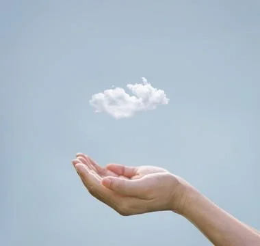 Cloud computing concept, cloud above hand of businessman Stock Photos
