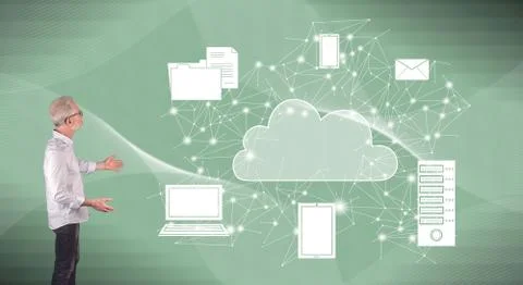 A cloud computing concept explained by a businessman on a wall screen Stockfoto's