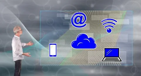 A cloud computing concept explained by a businessman on a wall screen Stockfoto's