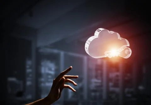 Cloud computing concept with glass symbol shown in hand. Mixed media 스톡 사진