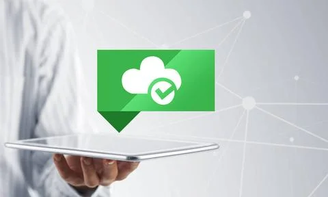 Cloud computing concept Hand of businessman holding tablet pc with cloud i... Foto stock