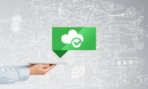 Cloud computing concept Hand of businessman holding tablet pc with cloud i... Stock Photos