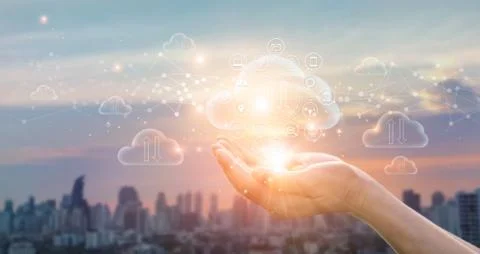 Cloud Computing Concept. Hands holding of Data protected exchange on sunset Stock Photos