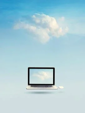 Cloud computing concept, Laptop floating with cloud on screen 스톡 사진