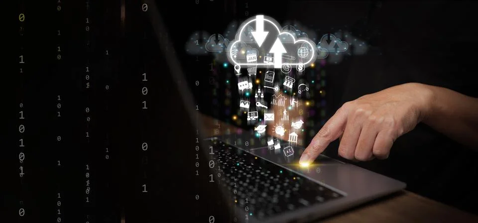 Cloud Computing Concept  A man uses laptop computer to upload and download .. Stock Photos