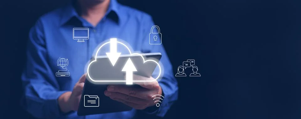 Cloud computing concept. A man using cloud computing service on a tablet to.. 写真素材