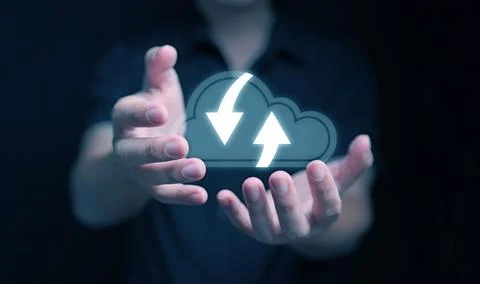 Cloud computing concept. A man using cloud computing service in his hands t.. Foto stock