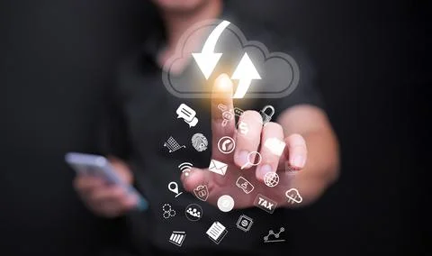 Cloud computing concept. A man using cloud computing service to enable acce.. 스톡 사진