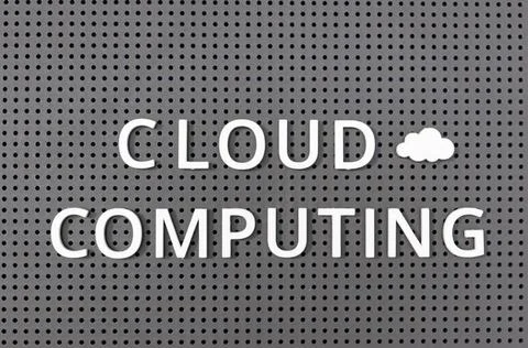 Cloud computing concept. Plastic letters message on gray board Cloud compu... Stock Photos
