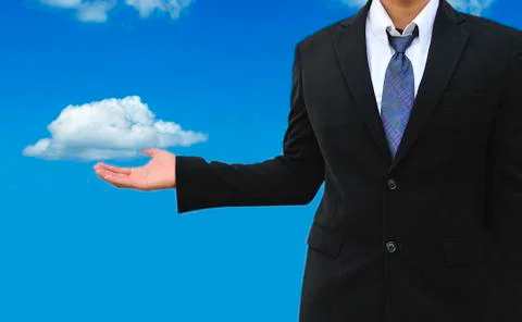Cloud computing concept, young businessman with cloud Stock Photos