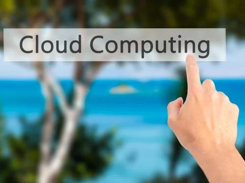Cloud Computing - Hand pressing a button on blurred background concept on vis Foto stock
