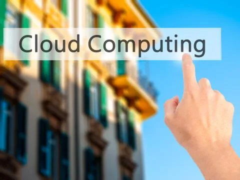 Cloud Computing - Hand pressing a button on blurred background concept on vis Foto stock