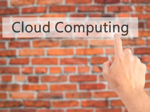 Cloud Computing - Hand pressing a button on blurred background concept on vis Stock Photos