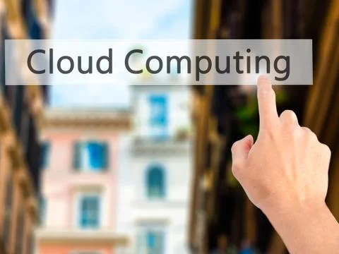 Cloud Computing - Hand pressing a button on blurred background concept on vis Foto stock