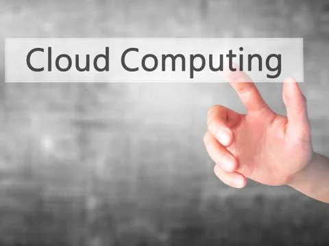Cloud Computing - Hand pressing a button on blurred background concept on vis Stock Photos