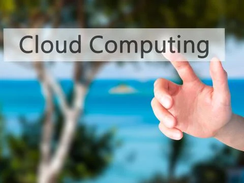 Cloud Computing - Hand pressing a button on blurred background concept on vis Stock Photos