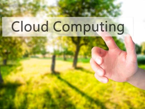 Cloud Computing - Hand pressing a button on blurred background concept on vis Stock Photos