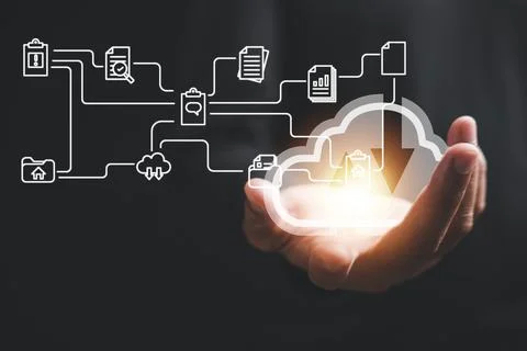 The cloud computing icon rests in the hand of a visionary businessman Stock Photos