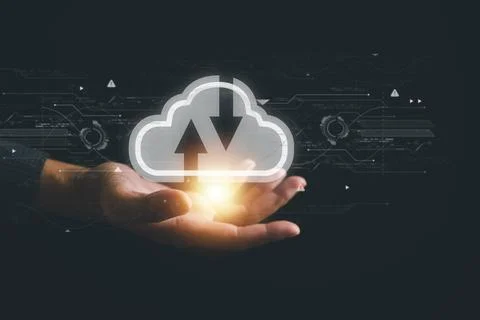 The cloud computing icon rests in the hand of a visionary businessman 스톡 사진