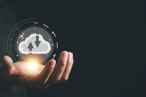 The cloud computing icon rests in the hand of a visionary businessman Stock Photos