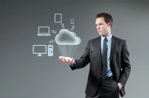 Cloud computing idea concept. man holding cloud hologram. Stock Illustration