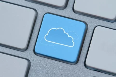 Cloud computing symbol at the computer key Stock Photos