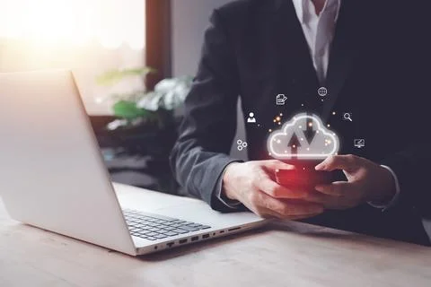 Cloud computing technology concept with businessman and smartphone, noteboo.. Stock Photos