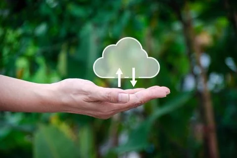 Cloud computing technology concept. Hand holding cloud icon on nature backg.. Foto stock