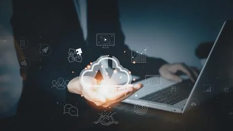 Cloud computing technology on hand of businessman. Man is using notebook (Lap Stock Photos