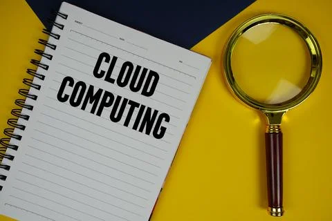 Cloud Computing text with magnifying glass on yellow background Stock Photos