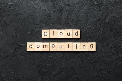 Cloud computing word written on wood block. Cloud computing text on cement .. Stock Photos