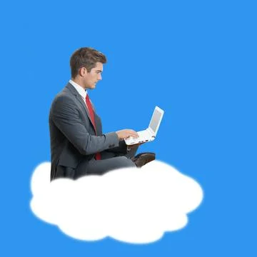 Cloud computing young businessman with laptop computer sitting on a cloud ... Stock Photos