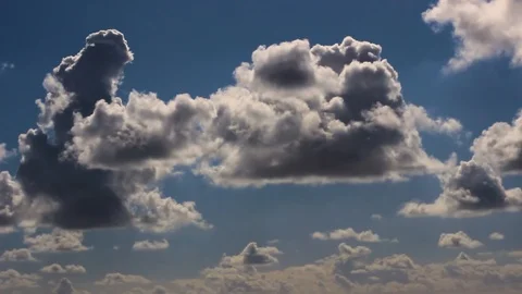 Cloud cover timelapse parallax against blue sky. Stock Footage 121715089