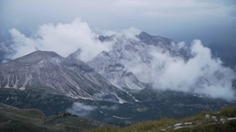 Cloud covered mountain landscape during dawn, 4K Stock Footage 129610407