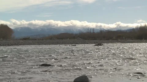 Cloud covered mountains and river Video stock 8523349