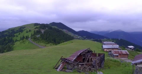 Cloud-covered mountains and traditional houses in the famous Sal Plateau Stock Footage 280345083