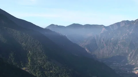 Cloud covering the valley of Andorra la Vella Stock Footage 33406174