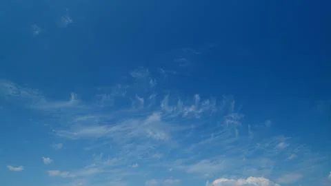 Cloud cumulus and cirrus on different layers clouds nature background. Blue sky Stock Photos